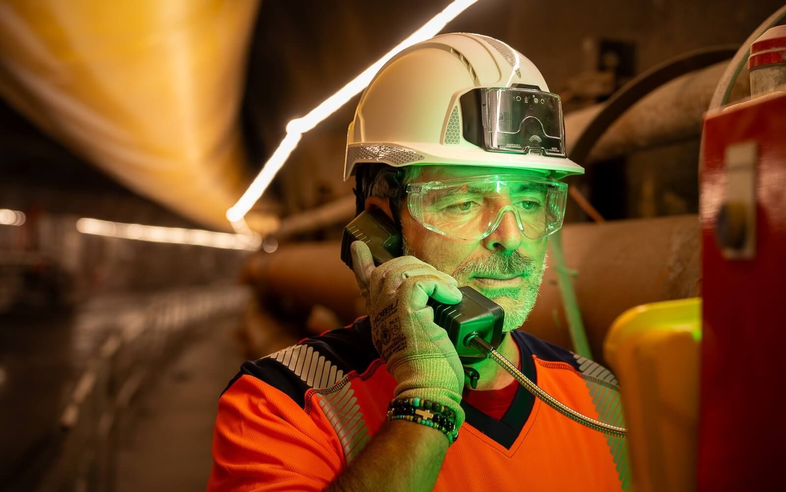 WISE operator on the phone in a tunnel